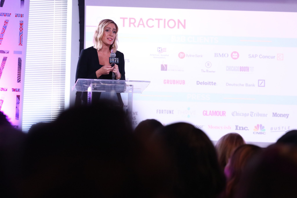 Ama La Vida CEO Nicole Wood giving speech in an event
