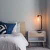 a lamp and a bed to help you think about your nightly routine