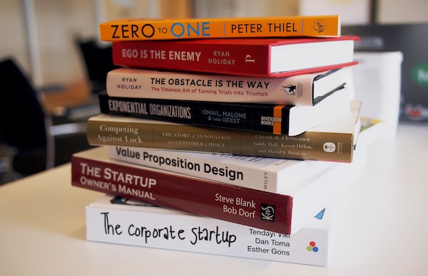 a stack of books to help with your personal development