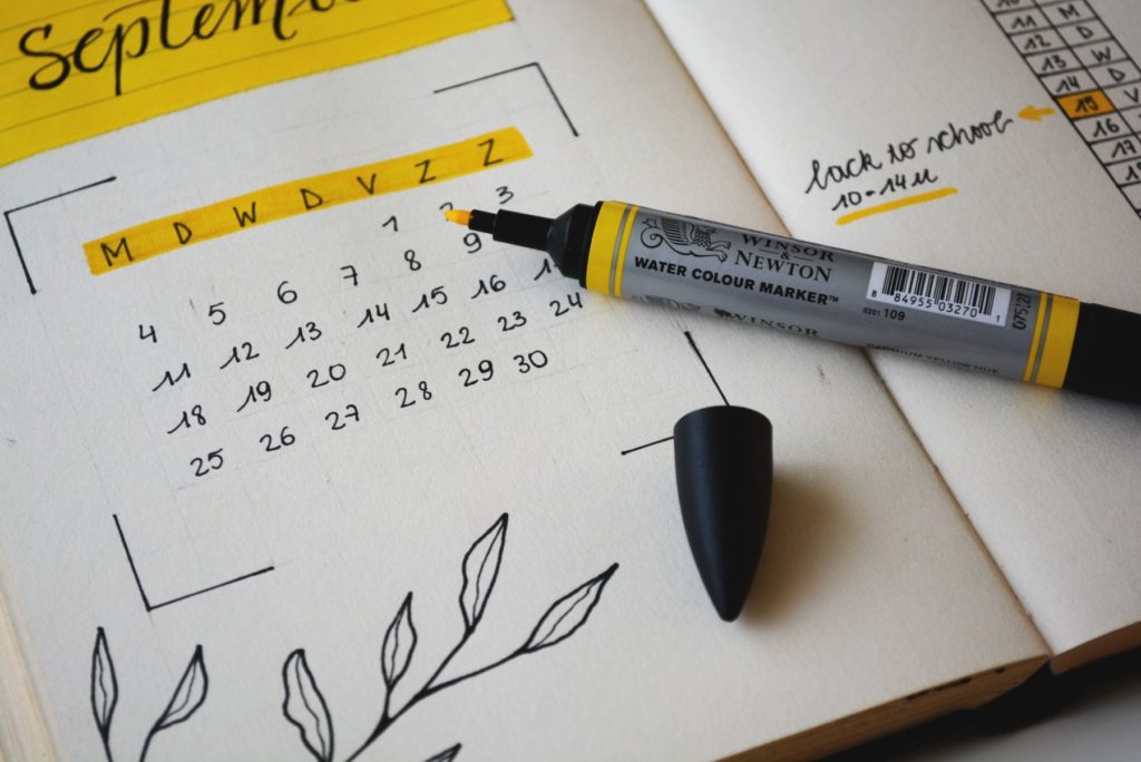 A calendar and a yellow marker