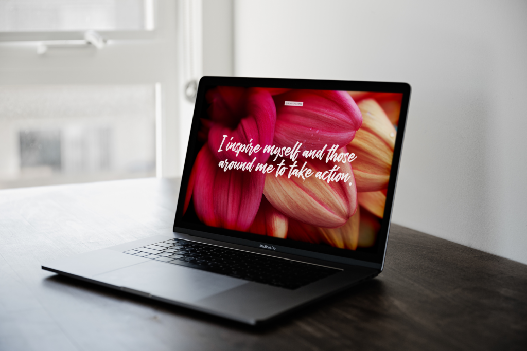 Tech background with flowers in the back and the words "I inspire myself and those around me to take action" written across the image