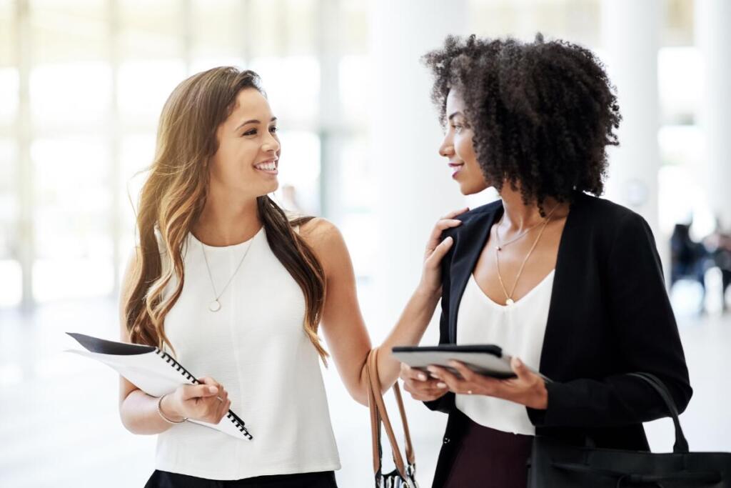 women walking and talking about career options