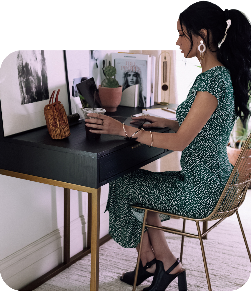 creative stylish young woman working at her cool home office