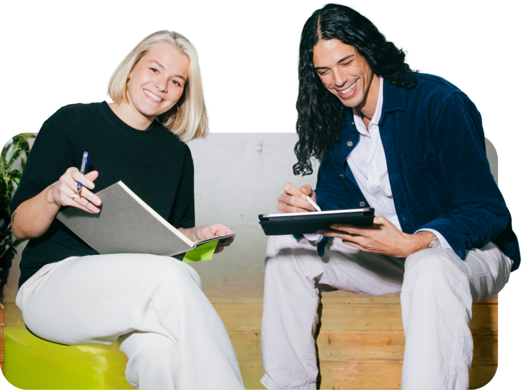 two cool young coworkers working together