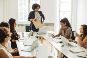 woman leading a meeting with colleagues