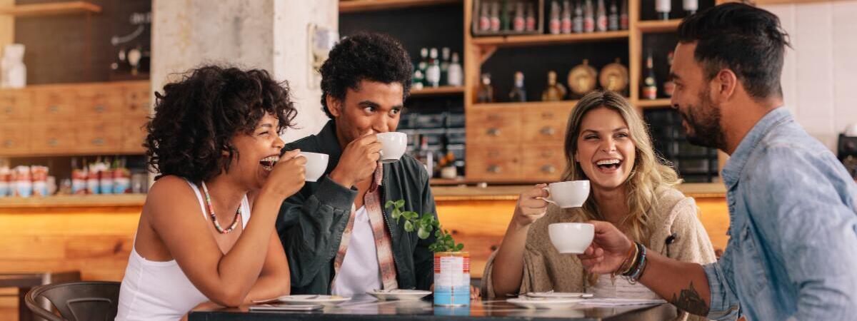 young professionals talking at a coffee shop