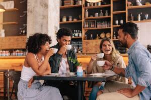 young professionals talking at a coffee shop