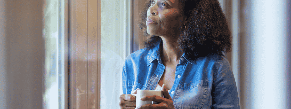 Woman reflecting on identity and purpose after retirement