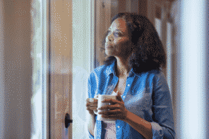 Woman reflecting on identity and purpose after retirement
