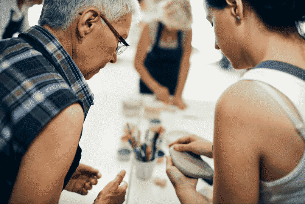 Mature woman teaching ceramics classes as an encore career.